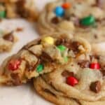 M&M Cookies on parchment paper.