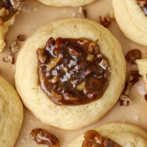 Close up of a pecan pie cookie (sugar cookie filled with caramel pecan filling).