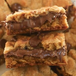 Two pieces of nutella cookie bars stacked on top of each other.