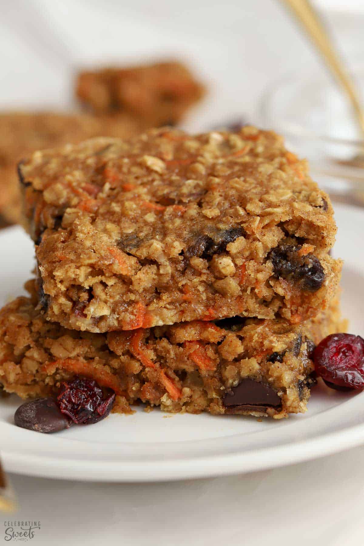 Two breakfast bars stacked on top of each other on a white plate.