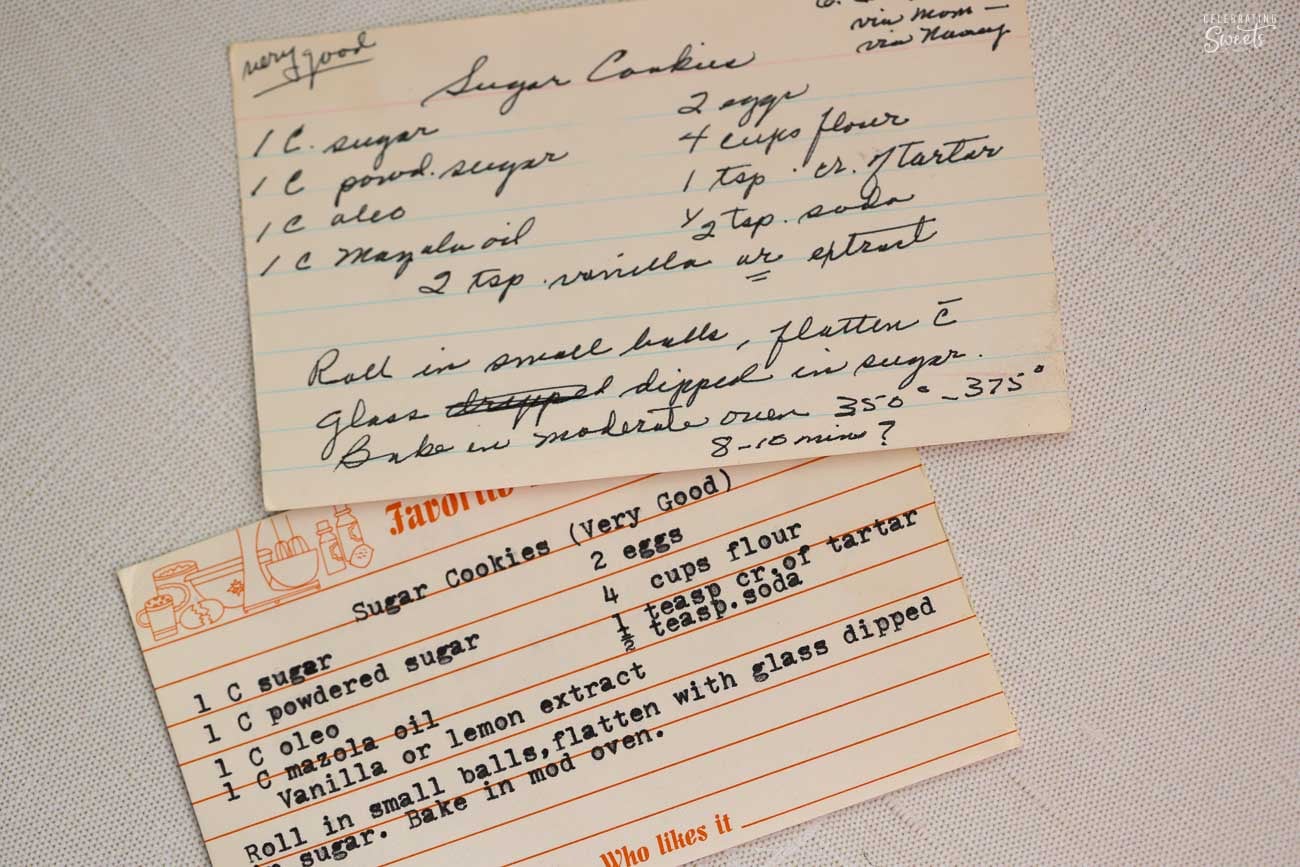 One handwritten recipe card and one typed recipe card for sugar cookies.