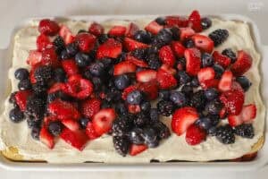 Berry tiramisu in a white rectangular baking dish