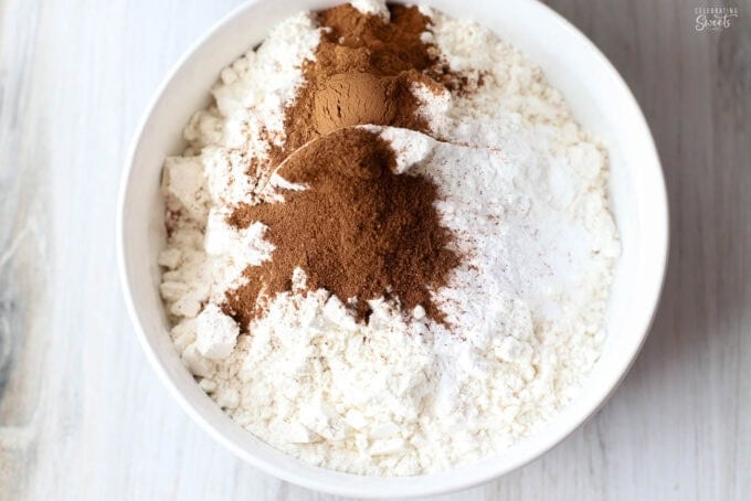 Flour and spices in a white bowl.