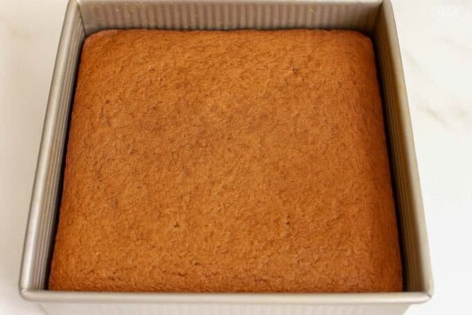 Gingerbread cake in a square metal pan.