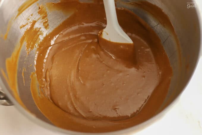 Gingerbread cake batter in a metal bowl.